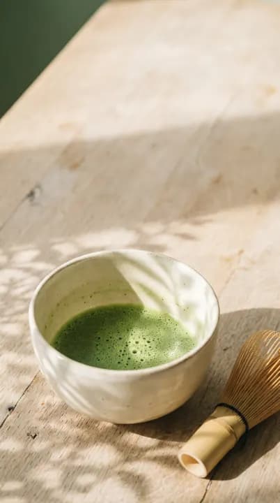 Quiet Ritual phone wallpaper with a ceramic matcha bowl